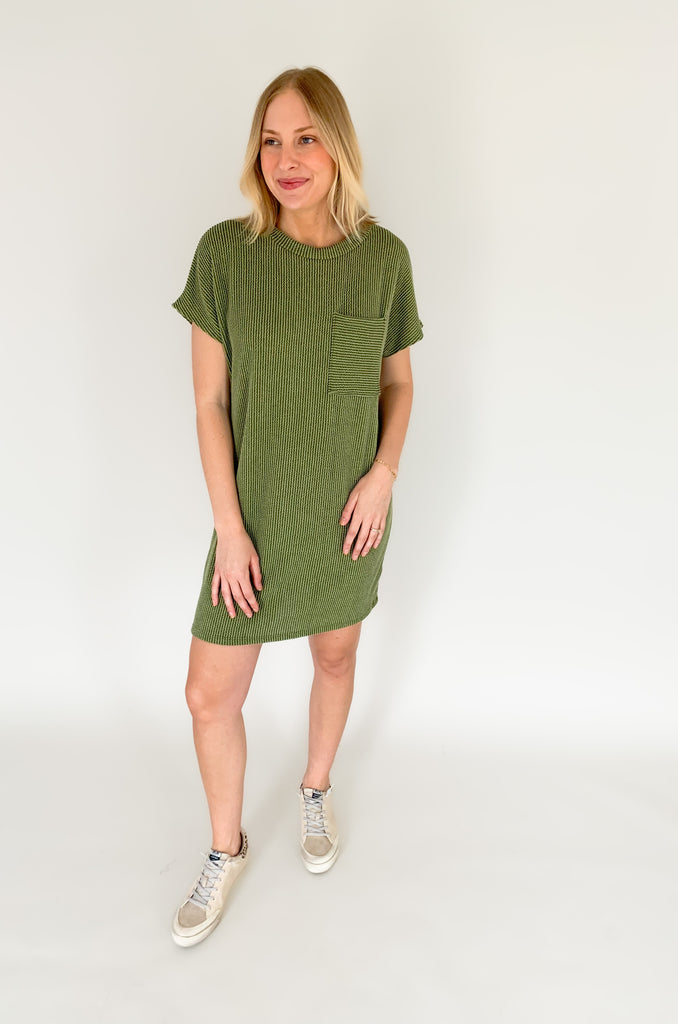 This ribbed shirt dress is a stylish way to stay comfortable. The short sleeves and front pocket make it practical and ideal for everyday wear, while the ribbed fabric gives it a unique and fashionable look. Add to your outfit with our Dee Denim Jacket for a layered look! Show off your style with the Jump on In Ribbed Shirt Dress! 