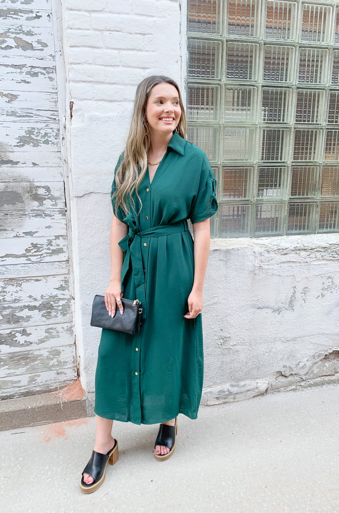 short sleeve long midi dress with gold button details, cuffed sleeves, and a waist belt-available in black and forest green