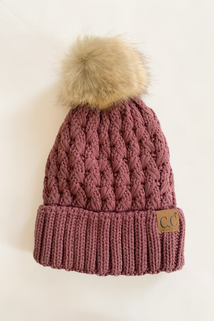 Lattice Crossover Stitch Knit Pom Beanie is ultra cozy with a soft inner lining. The colors are gorgeous, turning cold weather gear into a fashion statement. Choose between several to complete you look! 
