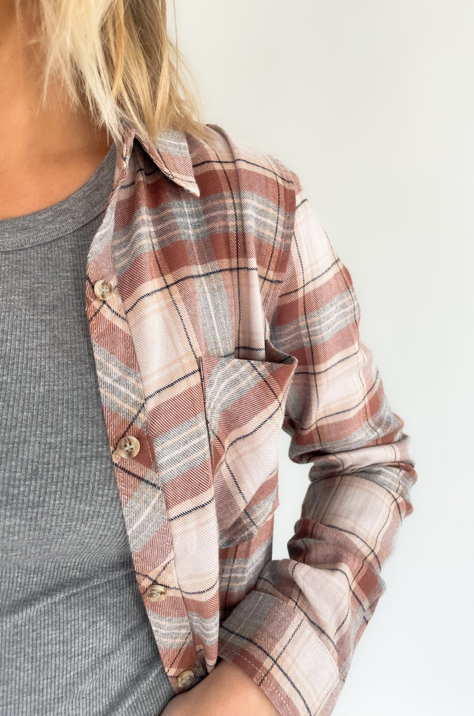 beige, pink, brown, and denim plaid flannel with single pocket