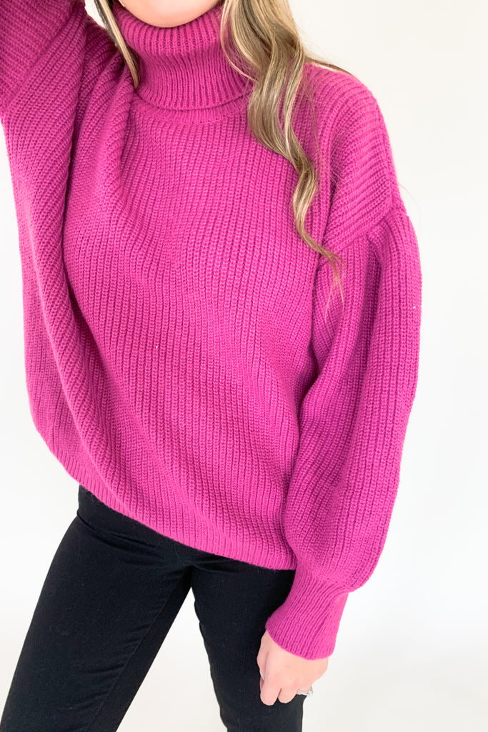 This turtleneck sweater with loose silhouette is perfect for the holiday season! The color is absolutely stunning. Who is not obsessed with magenta right now!? With a bold ballon sleeve silhouette, turtleneck, and luxe knitted fabric, you will be reaching for this amazing sweater all season! 