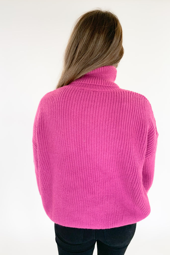 This turtleneck sweater with loose silhouette is perfect for the holiday season! The color is absolutely stunning. Who is not obsessed with magenta right now!? With a bold ballon sleeve silhouette, turtleneck, and luxe knitted fabric, you will be reaching for this amazing sweater all season! 