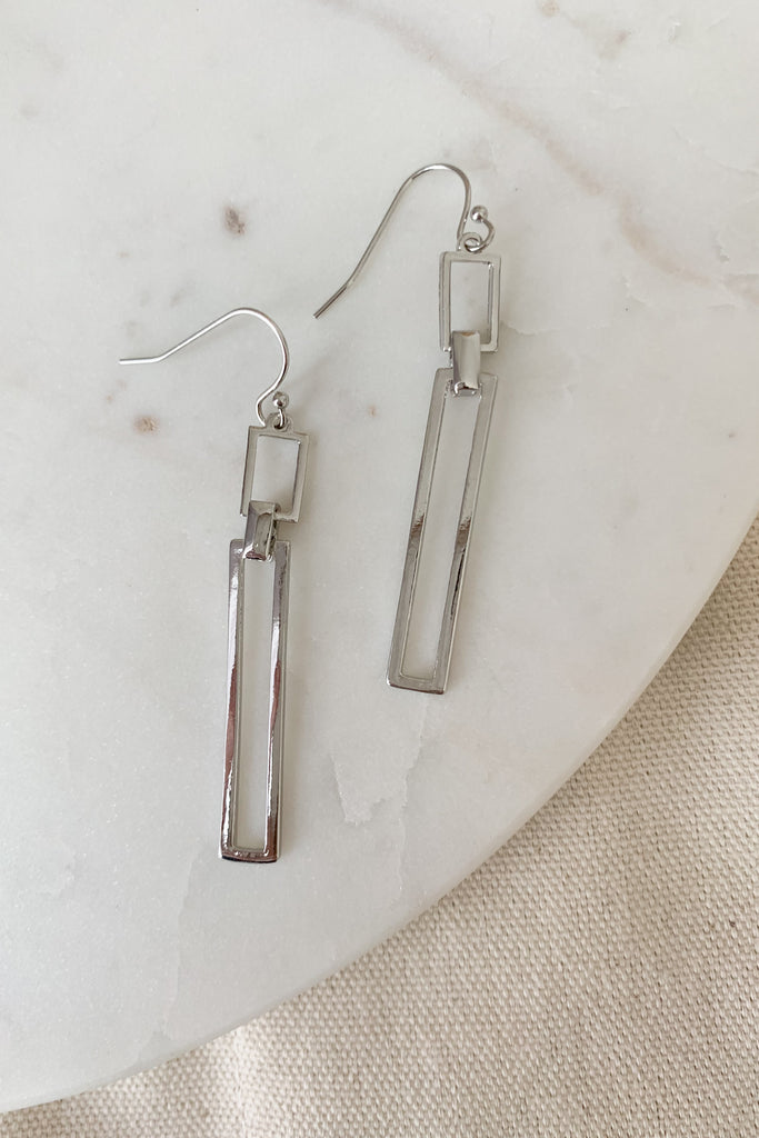 The Long Silver Rectangular Link Earrings are elevated and easy. They will go great with any look and pair pack to your other silver jewelry. Plus, the rectangular design is very on trend for jewelry. 