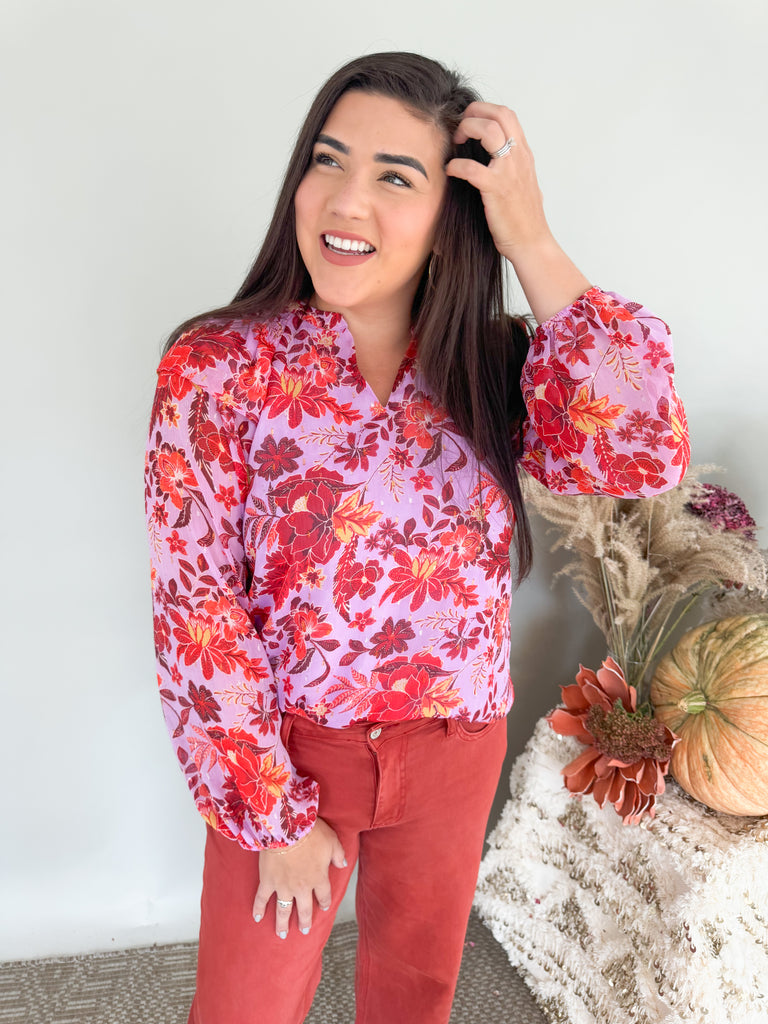 The Lucy Lavender + Plum Floral Blouse is a showstopper! It's made with a gorgeous purple fabric with hints of terracotta in the unique floral print. This blouse can totally be worn throughout several season and be dressed up or down. We had fun pairing it with our new High Rise Crop Wide Leg Jeans.