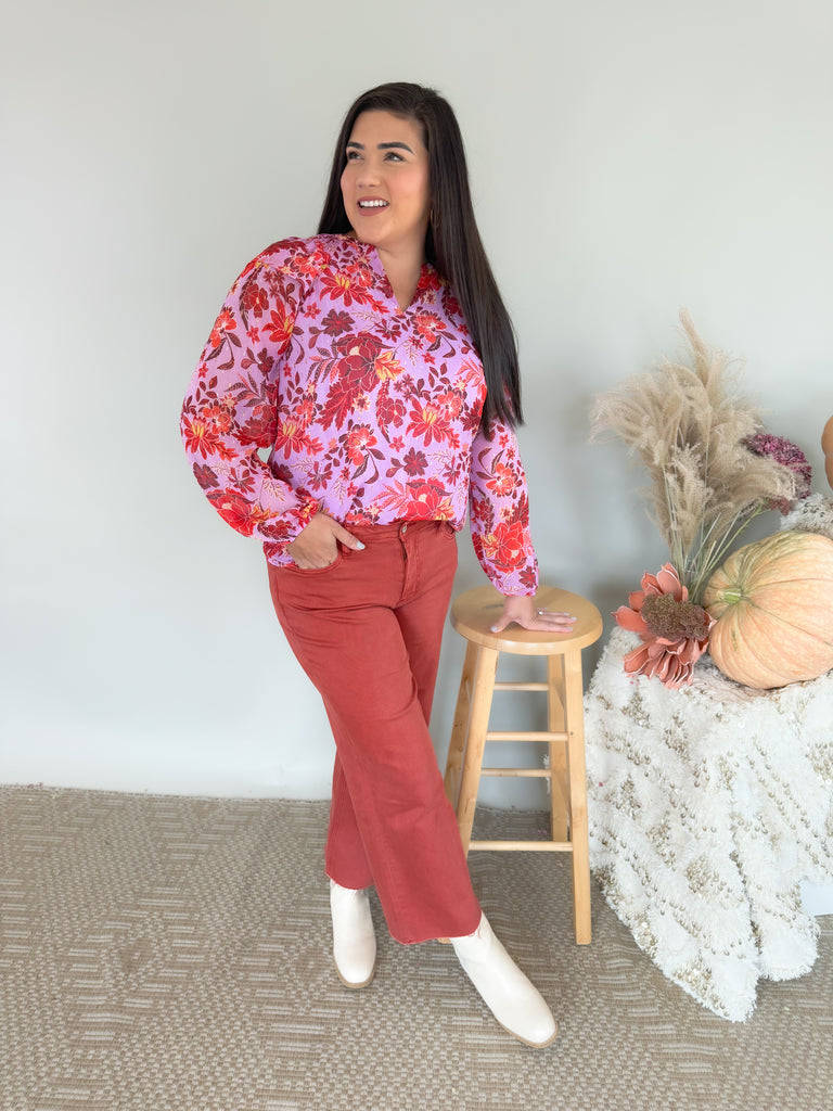 The Lucy Lavender + Plum Floral Blouse is a showstopper! It's made with a gorgeous purple fabric with hints of terracotta in the unique floral print. This blouse can totally be worn throughout several season and be dressed up or down. We had fun pairing it with our new High Rise Crop Wide Leg Jeans.