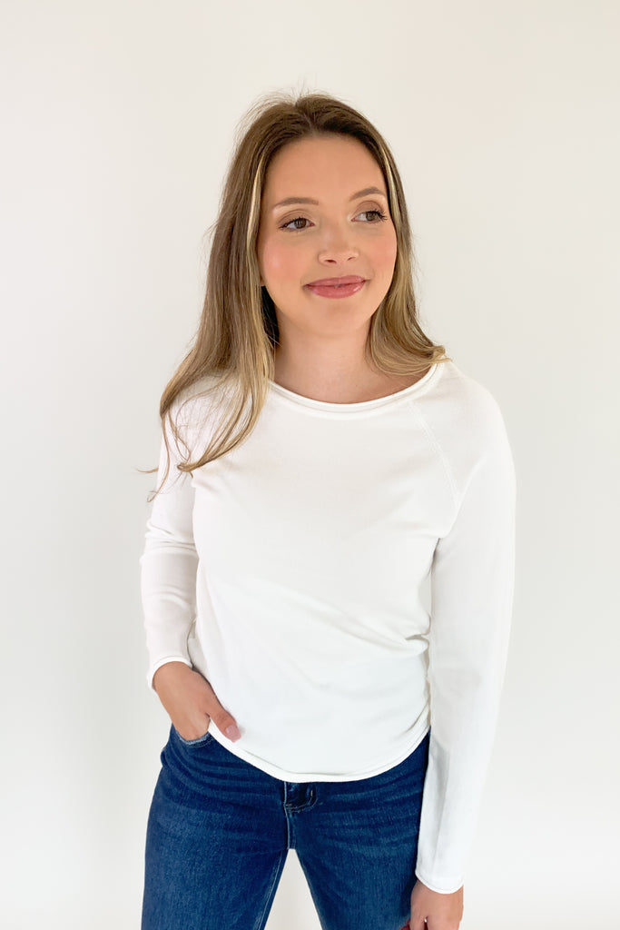 Soft, scoop neck long sleeve sweater available in several colors and Sizes: small-xlarge