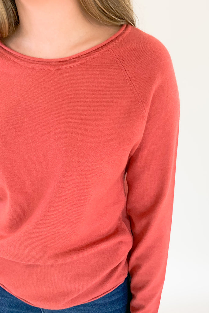 Soft, scoop neck long sleeve sweater available in several colors and Sizes: small-xlarge