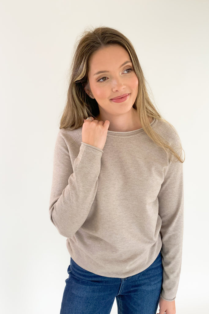Soft, scoop neck long sleeve sweater available in several colors and Sizes: small-xlarge