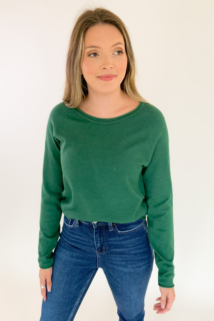 Soft, scoop neck long sleeve sweater available in several colors and Sizes: small-xlarge