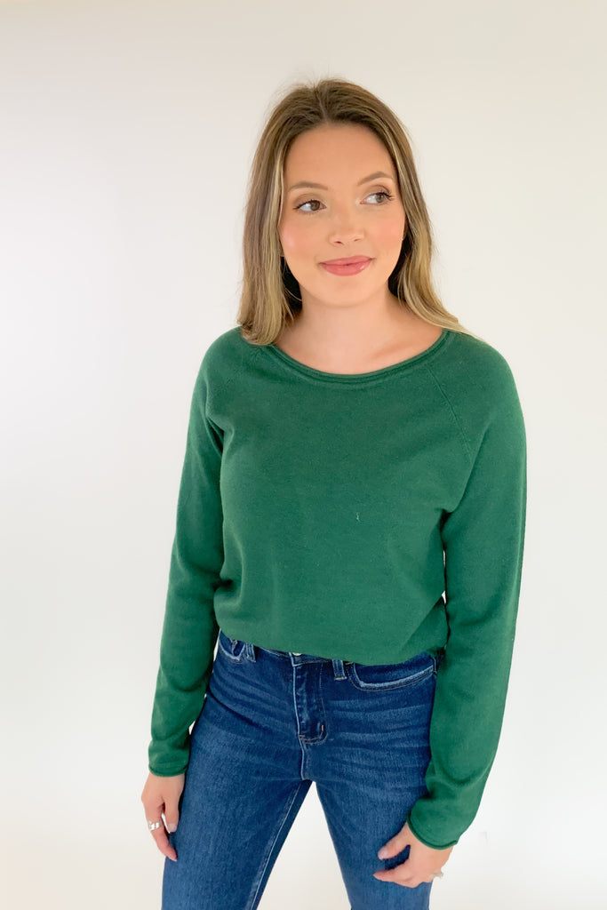 Soft, scoop neck long sleeve sweater available in several colors and Sizes: small-xlarge