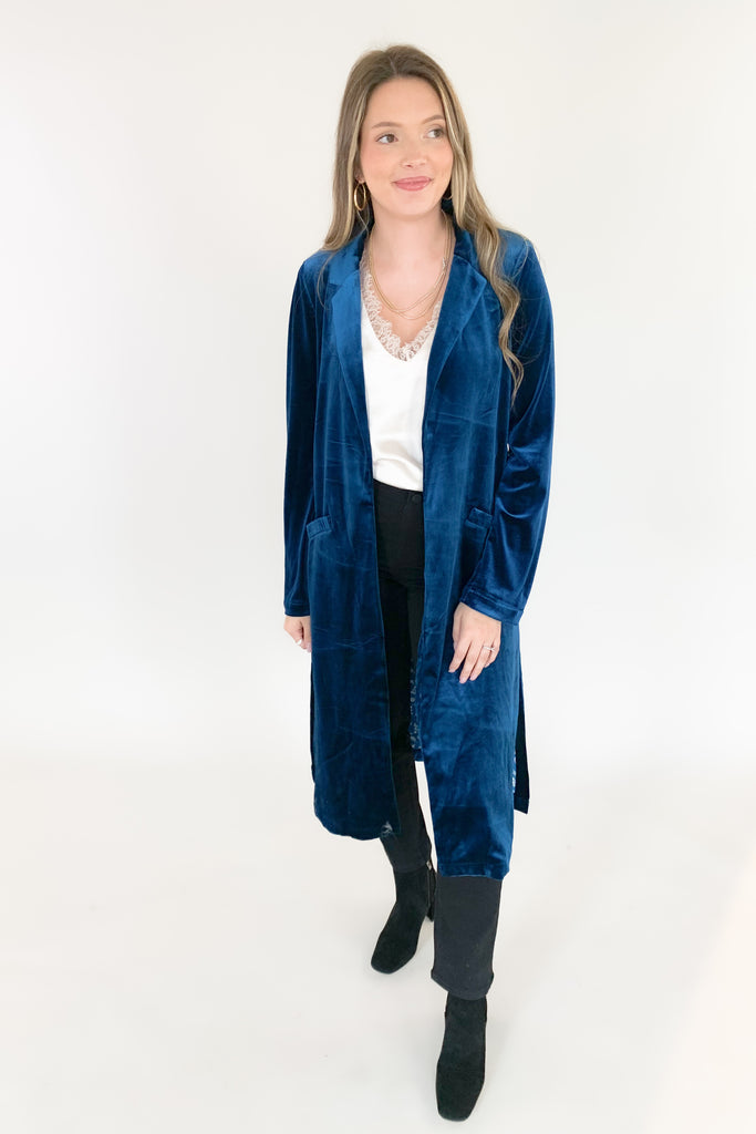 Skies are blue long velvet duster with lapel collar and gorgeous floral satin lining. Available in terracotta, magenta, purple, and teal