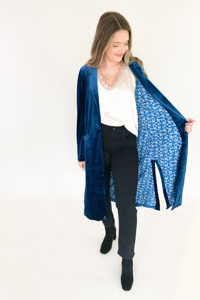 Skies are blue long velvet duster with lapel collar and gorgeous floral satin lining. Available in terracotta, magenta, purple, and teal