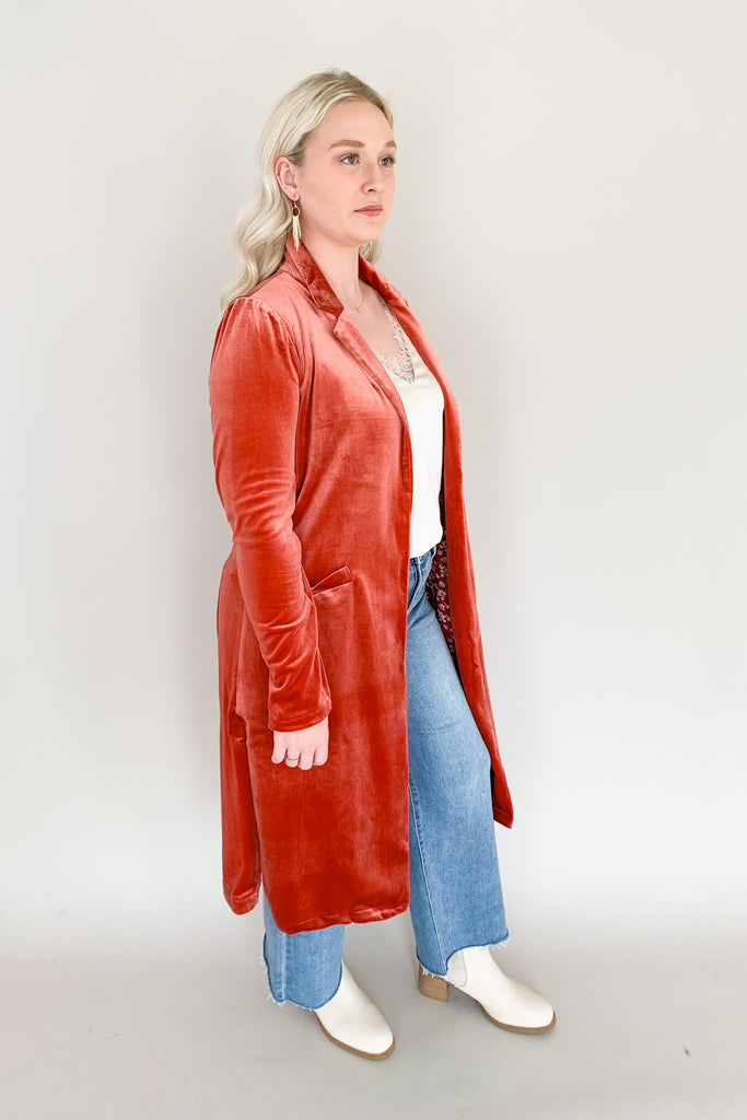 Skies are blue long velvet duster with lapel collar and gorgeous floral satin lining. Available in terracotta, magenta, purple, and teal