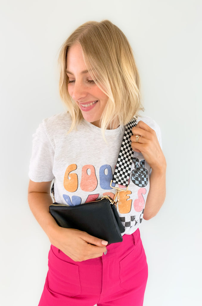 cotton crewneck graphic tee with "good vibes" 70s inspired text and checkered design