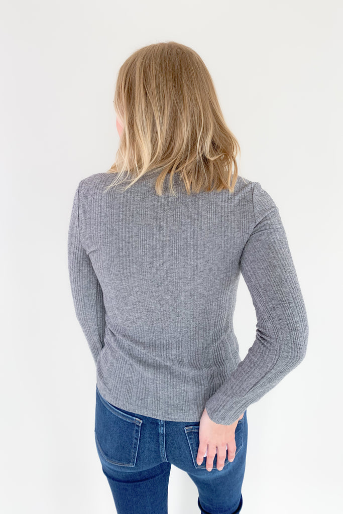 The Morgie Mock Neck Ribbed Top is a great style to have in your fall/winter wardrobe. It looks great on its own, but also would be a fantastic layering piece with its lightweight feel. The tops ribbed and stretchy too, creating a comfortable, elevated look. 