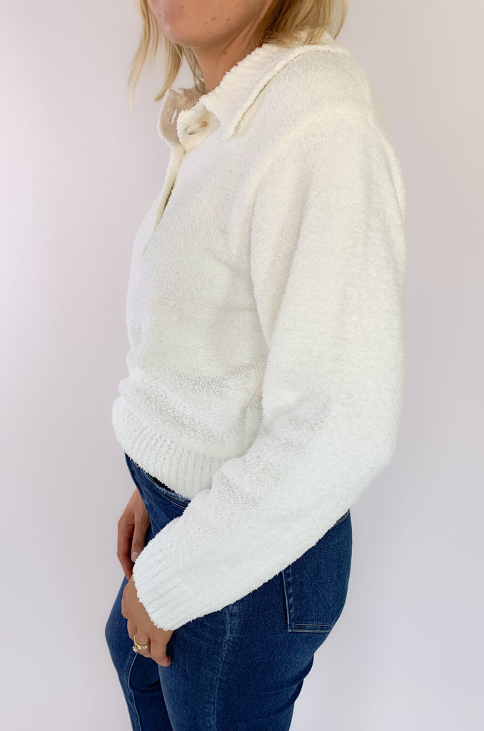 The UGG Mowery Top is a new favorite! Made with 70% recycled fibers, the UGG cozy knit is incredibly soft. Plus, the elevated texture adds a fun twist to any outfit. This half-placket top has a collar and buttons top.
