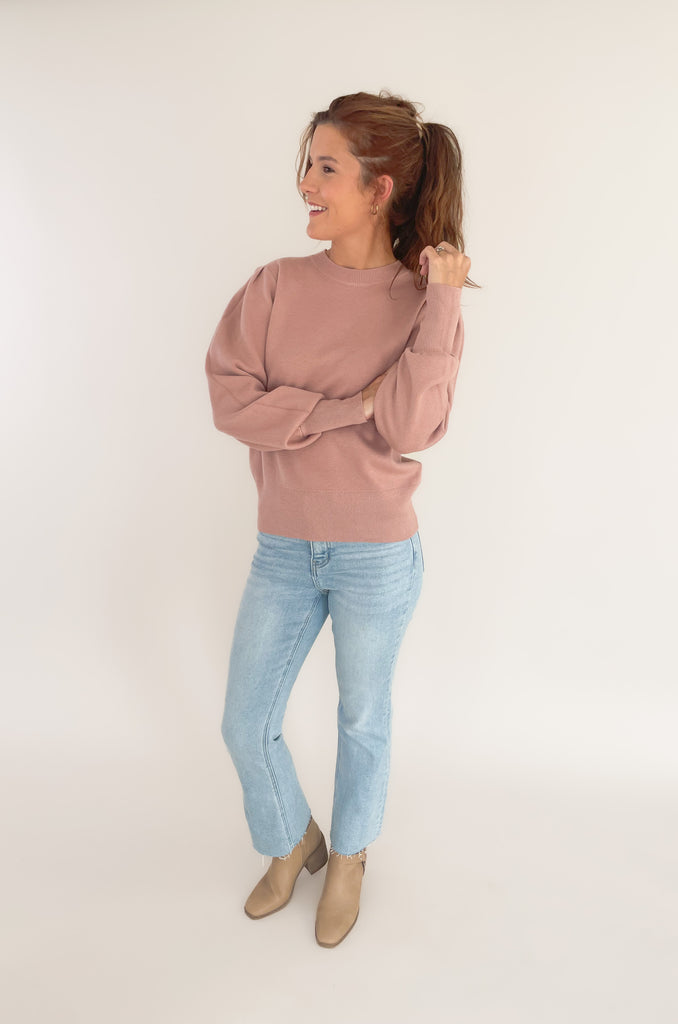 The Nana Puff Sleeve Sweater by Dreamers is so pretty and elevated. It is a solid color sweater with an ultra soft fabric, stretchy, and has puff long sleeves. It looks amazing dressed up or down for countless looks. 