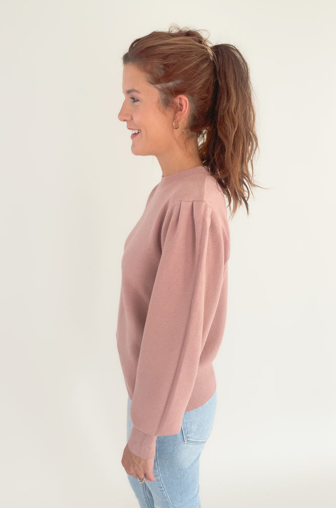 The Nana Puff Sleeve Sweater by Dreamers is so pretty and elevated. It is a solid color sweater with an ultra soft fabric, stretchy, and has puff long sleeves. It looks amazing dressed up or down for countless looks. 
