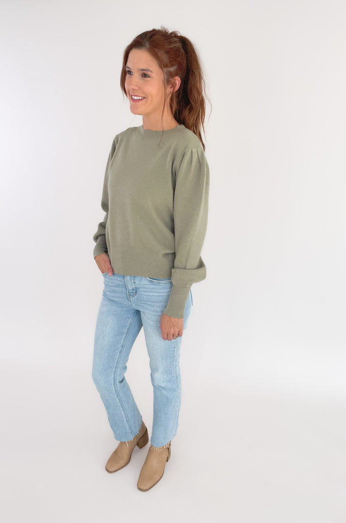 The Nana Puff Sleeve Sweater by Dreamers is so pretty and elevated. It is a solid color sweater with an ultra soft fabric, stretchy, and has puff long sleeves. It looks amazing dressed up or down for countless looks. 