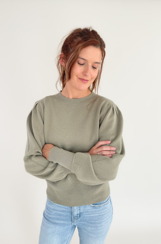 The Nana Puff Sleeve Sweater by Dreamers is so pretty and elevated. It is a solid color sweater with an ultra soft fabric, stretchy, and has puff long sleeves. It looks amazing dressed up or down for countless looks. 
