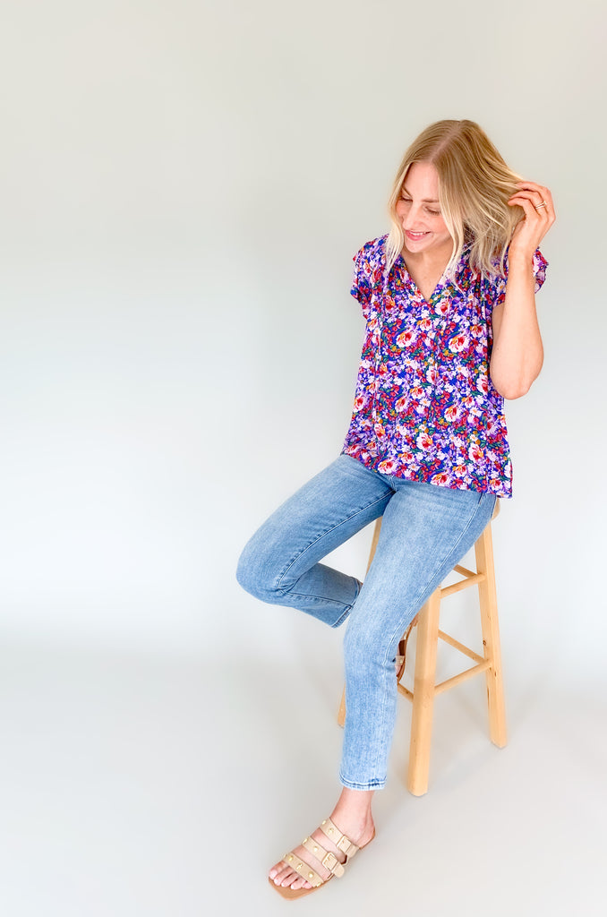 The Natalia Floral Print Ruffle Short Sleeve Blouse is perfect for any occasion with its bright floral design and gorgeous details! Combined with a v-neck tie detail and tiered ruffle sleeves, this blouse will make you stand out. It is light, airy, and perfect for the summer. Choose between two colors to complete your look! 