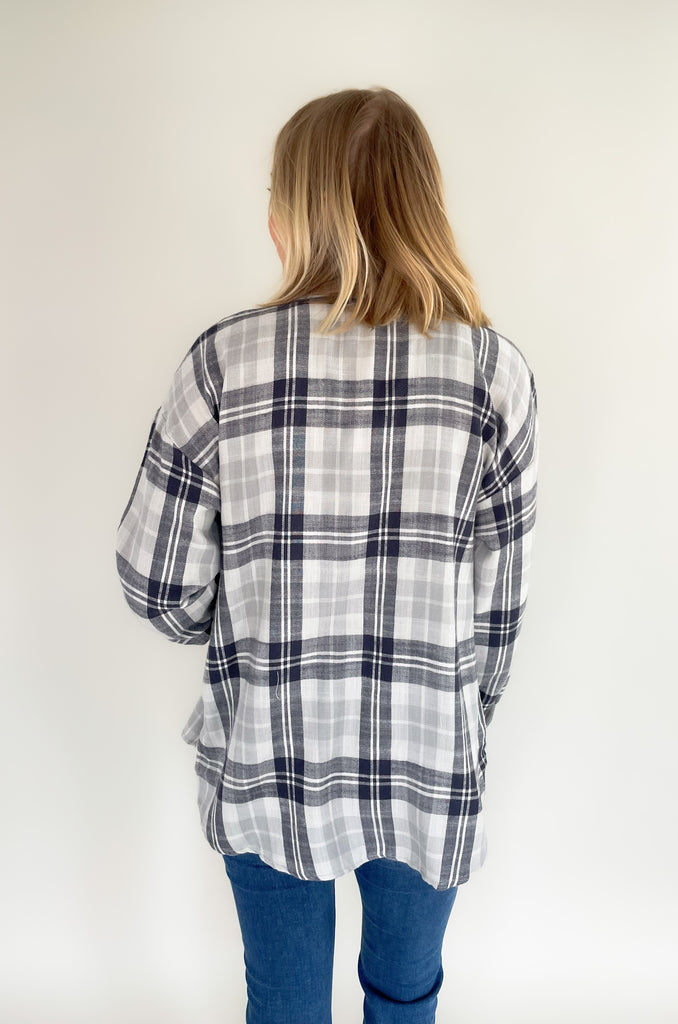 slightly oversized grey and navy flannel with single breast pocket