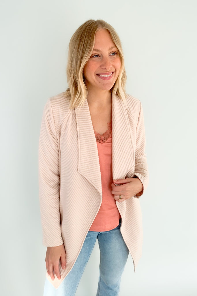 The Oaklynn Open Front Long Cardigan is elevated, chic, and timeless. You can easily dress it up or down for any event, making it such a versatile piece. The fabric is soft and stretchy too. There is a unique chevron stitching all over the cardigan for detail. We cannot say enough good things about this style- it's a must have! 