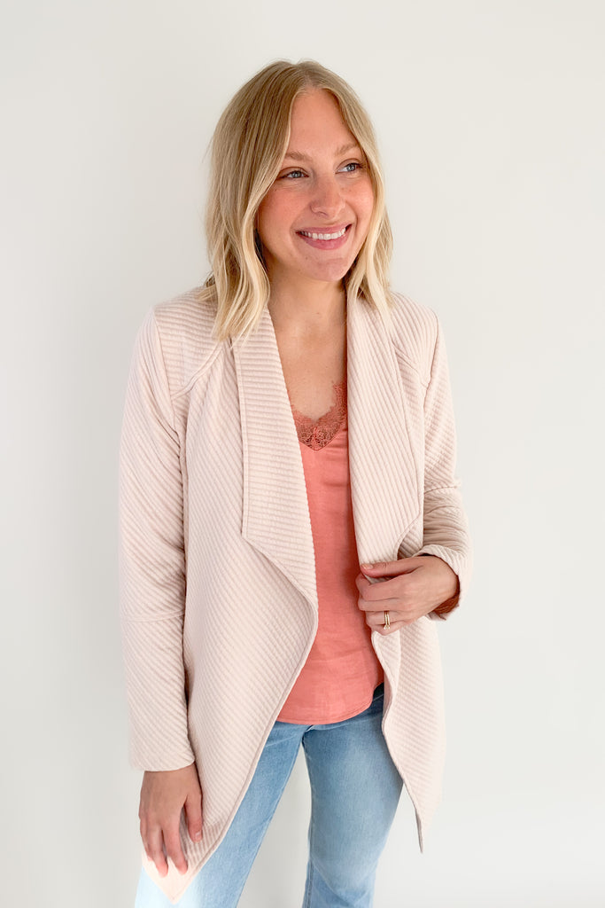 The Oaklynn Open Front Long Cardigan is elevated, chic, and timeless. You can easily dress it up or down for any event, making it such a versatile piece. The fabric is soft and stretchy too. There is a unique chevron stitching all over the cardigan for detail. We cannot say enough good things about this style- it's a must have! 