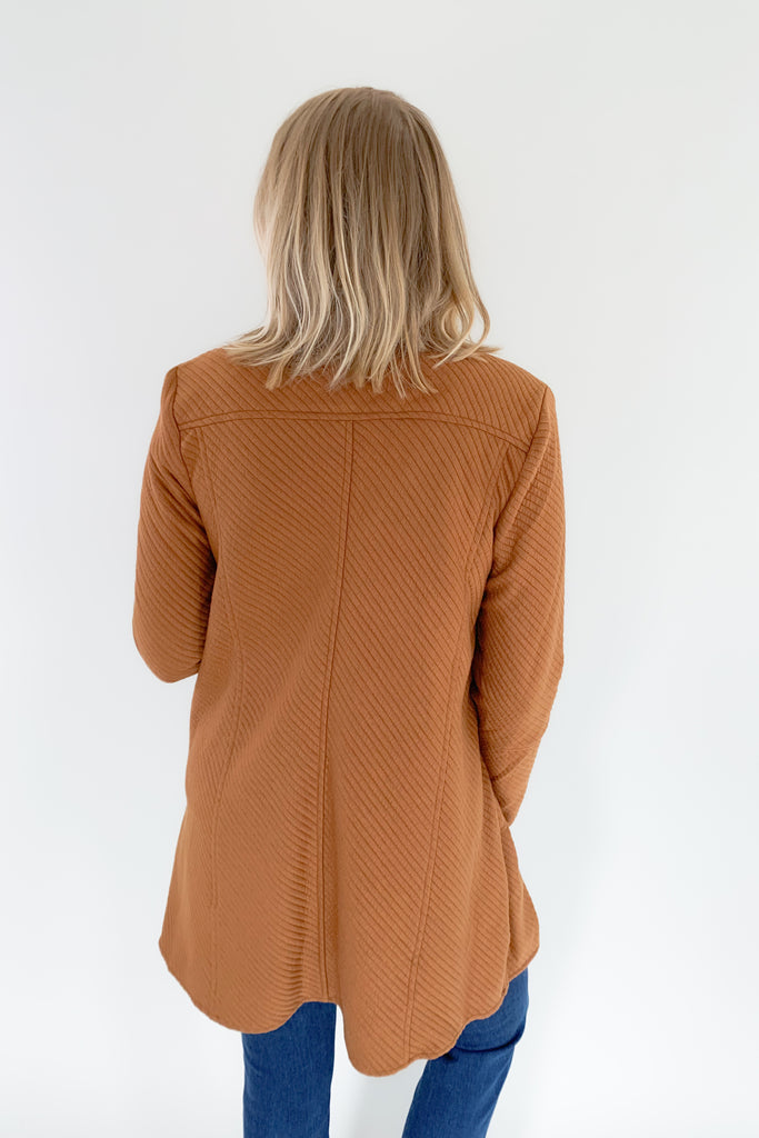 The Oaklynn Open Front Long Cardigan is elevated, chic, and timeless. You can easily dress it up or down for any event, making it such a versatile piece. The fabric is soft and stretchy too. There is a unique chevron stitching all over the cardigan for detail. We cannot say enough good things about this style- it's a must have! 