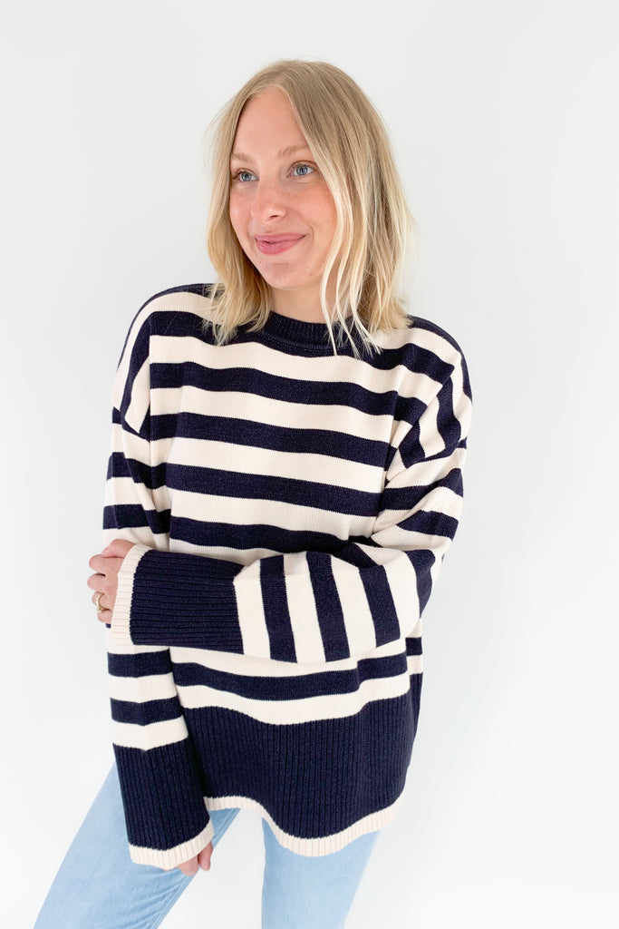 Stay cozy and stylish in this Oversized Stripe Print Crewneck Sweater! Featuring an eye-catching pink and ivory or navy and ivory striped print, it will be a favorite for fall. Color isn't going anywhere, so we love that this style embraces it. This sweater has large ribbed hem and cuff sleeves for extra warmth. Crafted from a soft and stretchy fabric, this sweater is perfect for cooler days. You cannot go wrong with adding one of these to your closet!