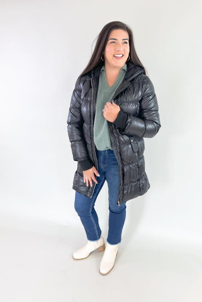 Stay stylish and warm in this Molly Bracken Puffer Jacket. Its padded black nylon shell is lined for extra insulation, and the adjustable hood and side pockets make it a practical addition to any winter wardrobe. You can dress it up or down all season! 