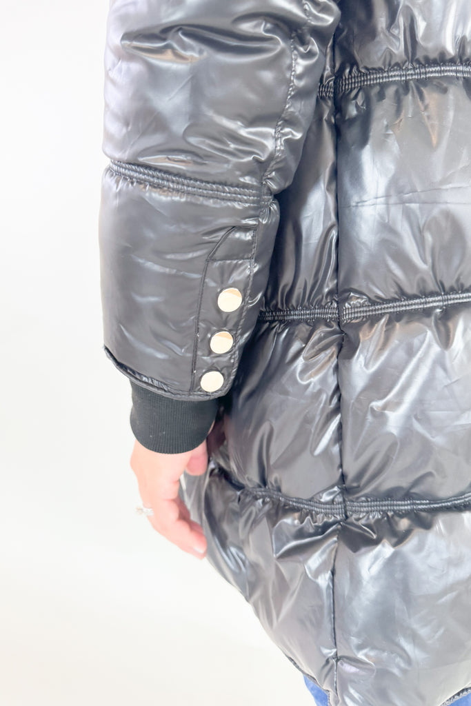 Stay stylish and warm in this Molly Bracken Puffer Jacket. Its padded black nylon shell is lined for extra insulation, and the adjustable hood and side pockets make it a practical addition to any winter wardrobe. You can dress it up or down all season! 