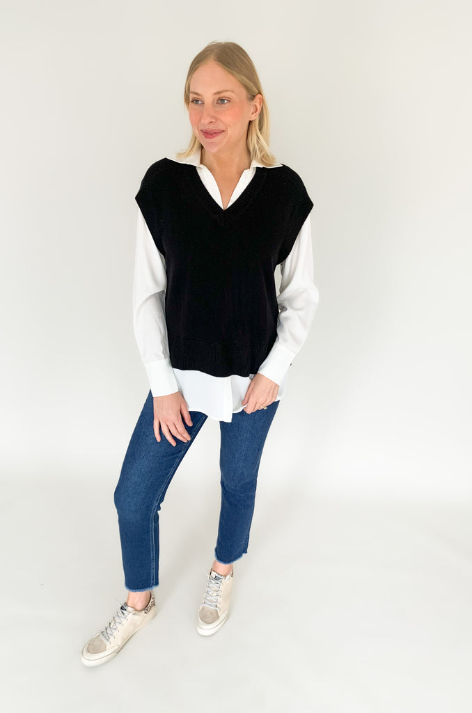 Stay stylish when the weather cools down with the Elan Geist Black Sweater Vest & Layered Blouse! This unique one-piece is made of knit fabric to keep you warm and comfortable, while featuring a flattering satin blouse underneath.