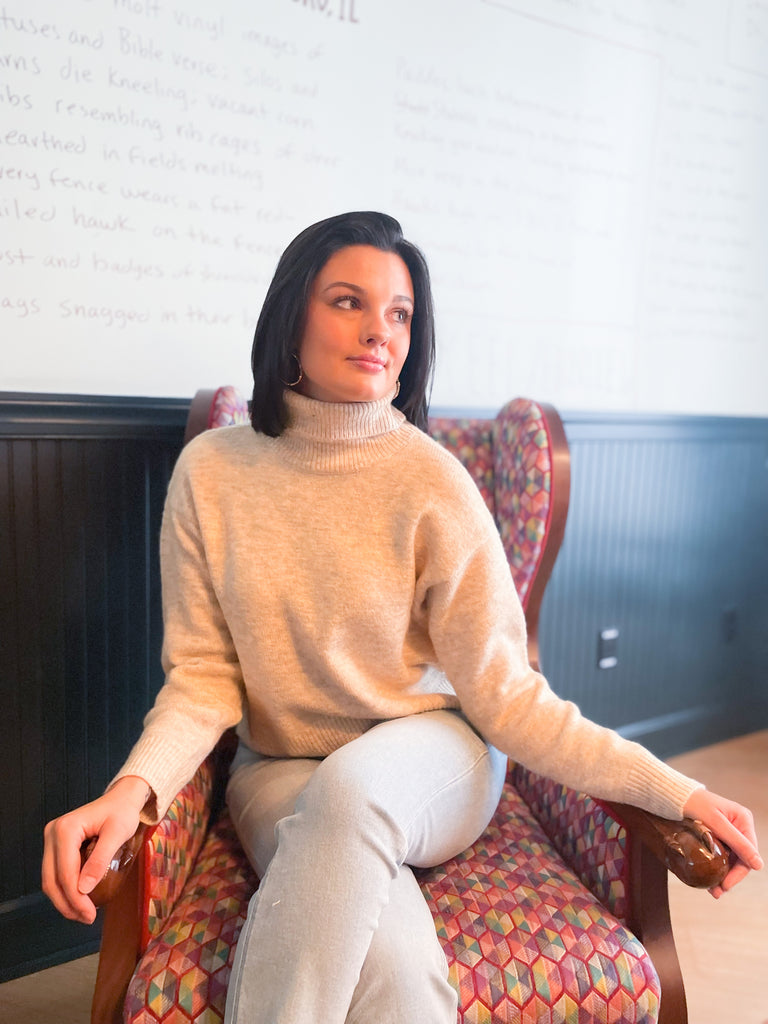 Stay warm and stylish this season with our Molly Bracken Turtleneck Drop Shoulder Sweater! Crafted with a textured, super soft fabric, this sweater features a classic, flattering fit, perfect for any wardrobe. Keep cozy and chic all season long.