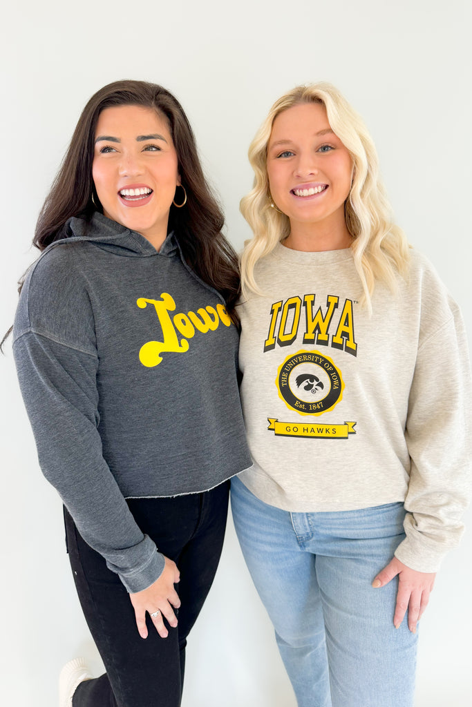 Iowa Old School Crew SweatshirtThe Iowa Old School Crew Sweatshirt is the ultimate combination of vintage style and comfort! Enjoy a cozy fleece interior and an eye-catching University of Iowa logo in vintage lettering on the front. Show off your Hawkeye pride with this unique sweatshirt, or gift one to your favorite Hawkeye!