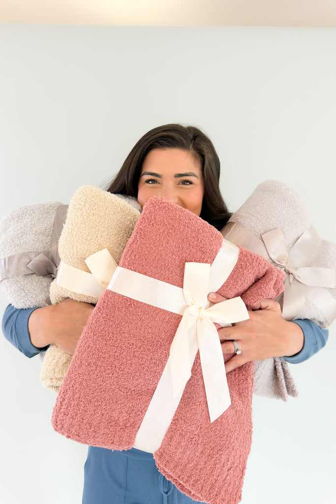 The 50"x60" Cozy Throw Blankets are so soft and elevated, making them incredible gifts for the holiday season! Not only are they super plush and a great weight, they also look really nice in any home.