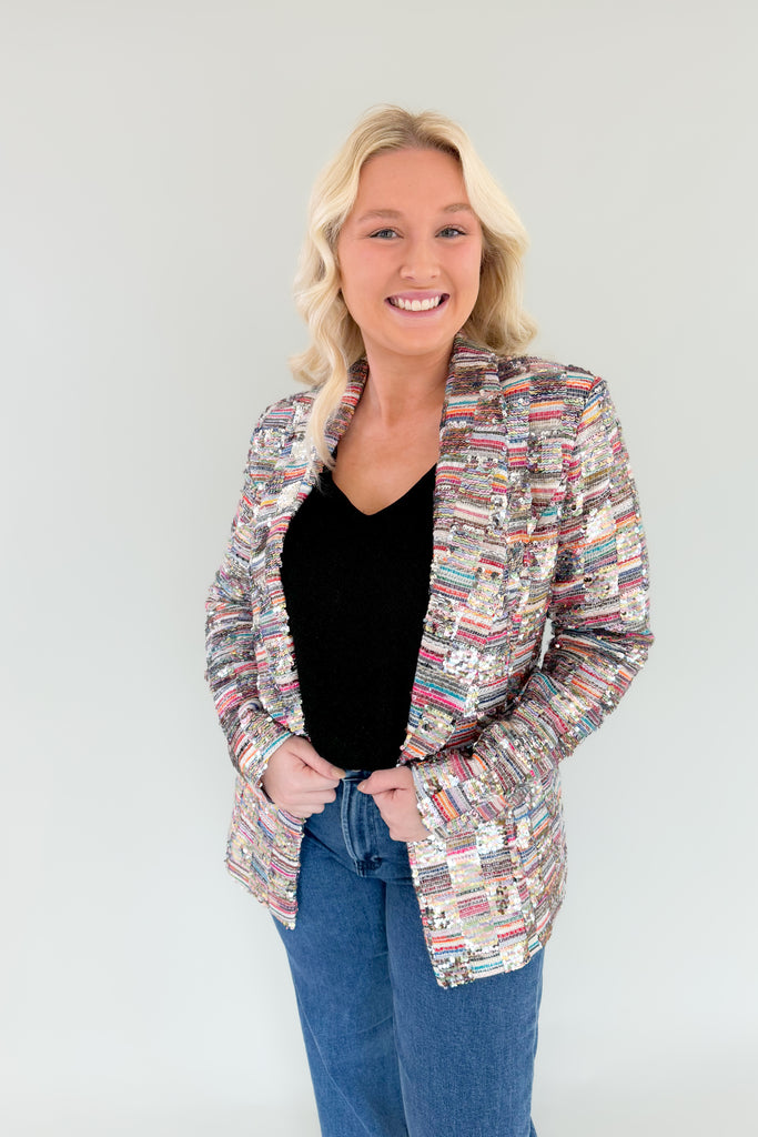 Dress up and shine for the night in the [Z SUPPLY] Vagabond Sparkle Tank! This lightweight, stretchy fabric is perfect for adding a sparkle to your outfit. Look stunning and feel confident for the evening. Layer it under your favorite blazer or cardigan to complete the look!