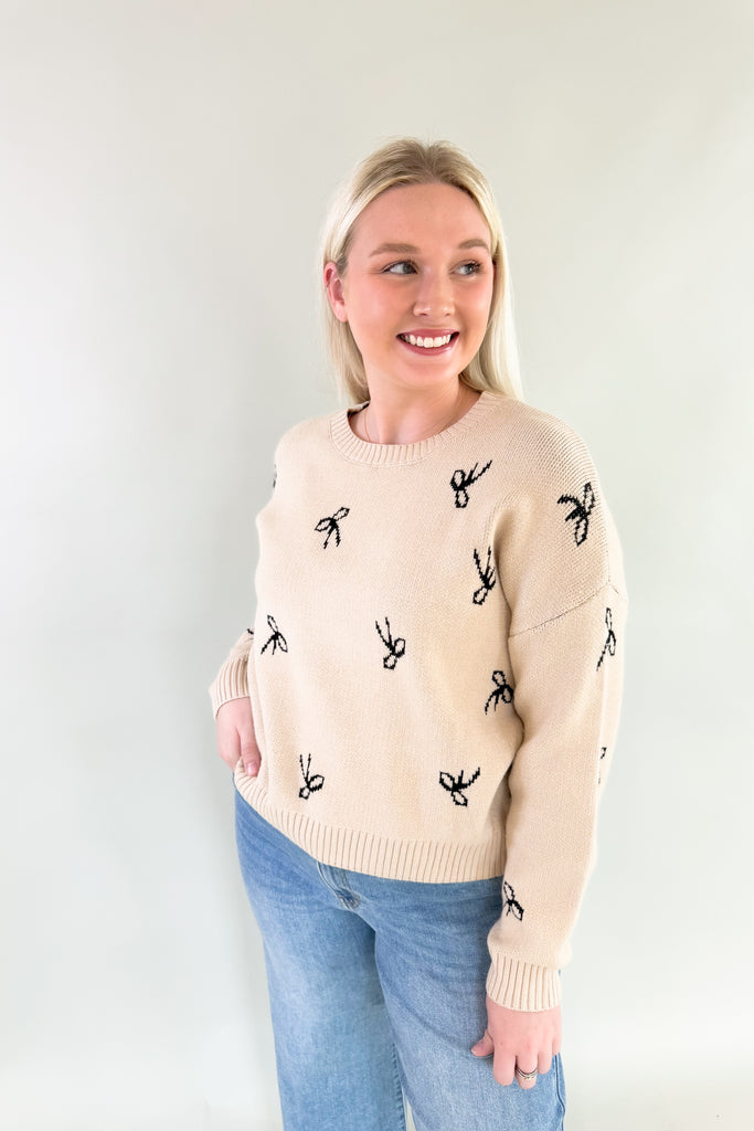 You know we love everything from Dreamers! This new Ribbon Pattern Pullover Sweater is no exception with its ultra plush and soft fabric, cute ribbon design. It feels festive, but is still subtle to be worn throughout the year. The neutral colors pair with everything too! You cannot go wrong with this one. 