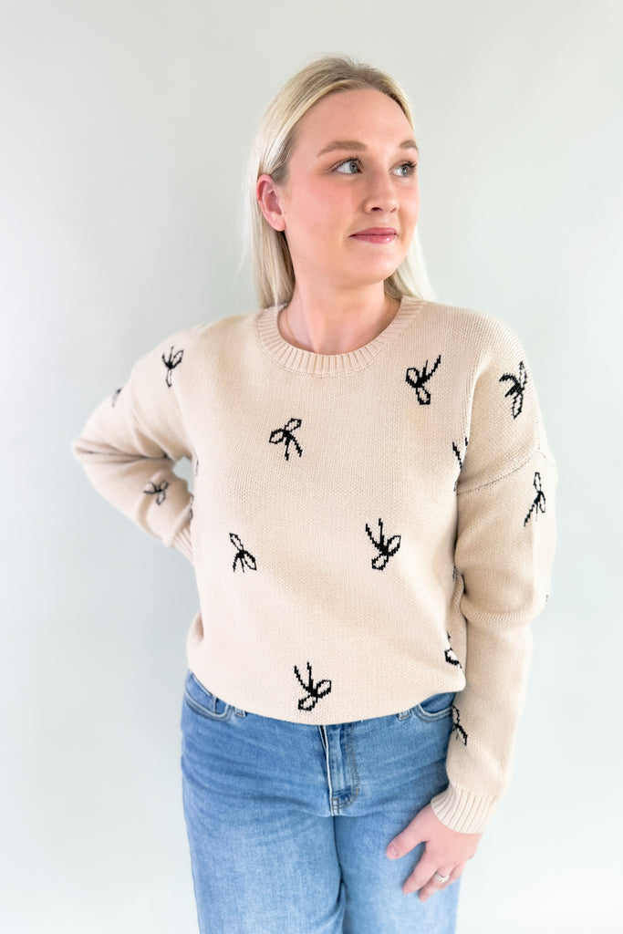 You know we love everything from Dreamers! This new Ribbon Pattern Pullover Sweater is no exception with its ultra plush and soft fabric, cute ribbon design. It feels festive, but is still subtle to be worn throughout the year. The neutral colors pair with everything too! You cannot go wrong with this one. 