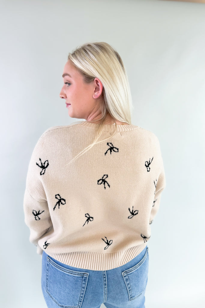 You know we love everything from Dreamers! This new Ribbon Pattern Pullover Sweater is no exception with its ultra plush and soft fabric, cute ribbon design. It feels festive, but is still subtle to be worn throughout the year. The neutral colors pair with everything too! You cannot go wrong with this one. 