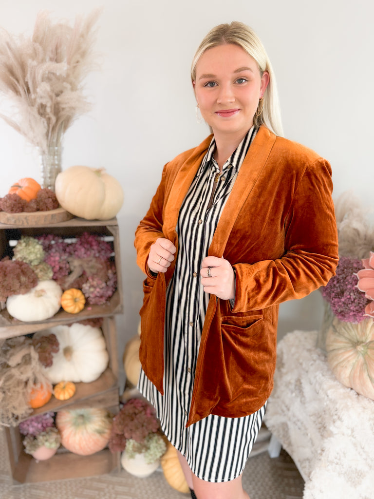 Make a statement in the Stella velvet blazer! With a timeless long-sleeve design and luxe velvet fabric, this blazer is a must-have for modern fashion lovers. Perfect for any occasion, but especially holidays. The versatility is endless too. Pull in colors of the teal blazer by pairing it with our Ecru Apricot Floral Long Sleeve Blouse, or pair anything with copper. 