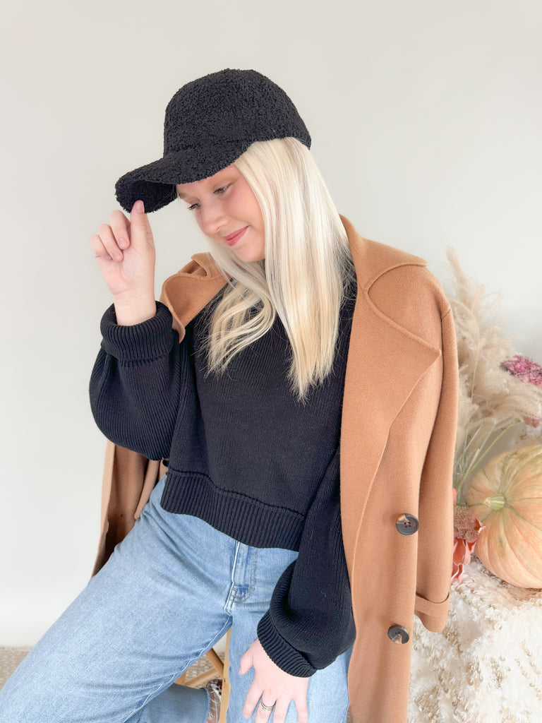 The Boucle Baseball Cap is a cute & trendy style that takes a casual hat to the next level! They are anything but boring, featuring a unique sherpa texture and cozy fit. These hats have an adjustable back too. 