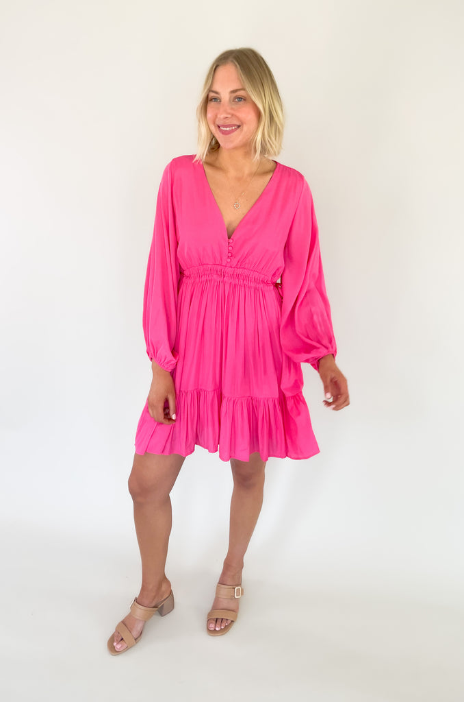 This Pinky Elastic Waistband V Neck Dress is perfect for a dinner date or special event. The baby doll shaped v neck provides a flirty and unique look while the tiered bottom adds a fun flounce. We are loving the elastic waist. It provide comfort and confidence with a great silhouette. 