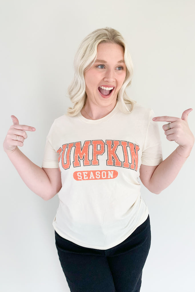 It's pumpkin season so we're celebrating with the cutest graphics! The Pumpkin Season Graphic Tee Shirt is comfortable, casual, and totally fall approved! It has a fun university inspired design with hints of orange. Layer it under cardigans or jackets all season long!