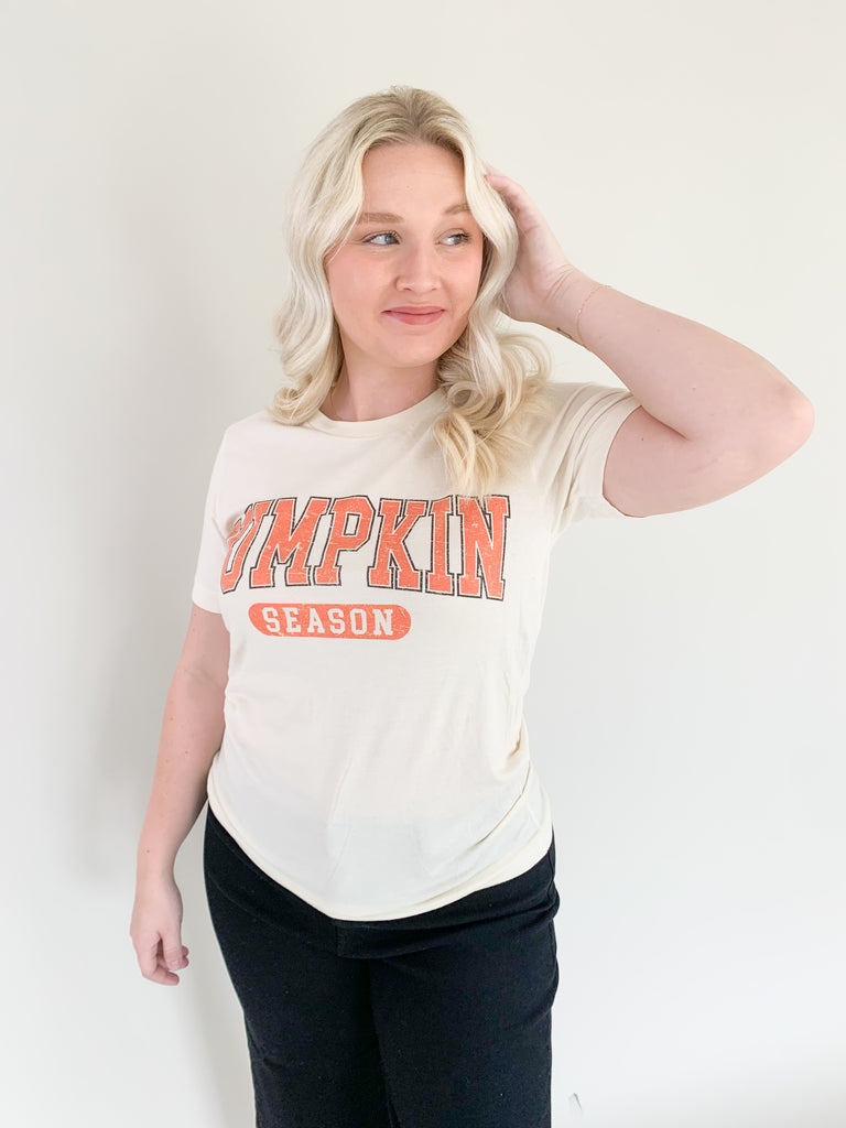 It's pumpkin season so we're celebrating with the cutest graphics! The Pumpkin Season Graphic Tee Shirt is comfortable, casual, and totally fall approved! It has a fun university inspired design with hints of orange. Layer it under cardigans or jackets all season long!