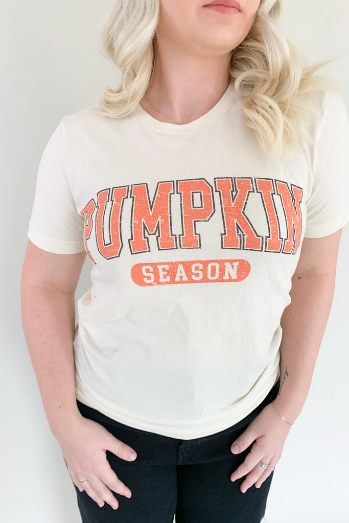 It's pumpkin season so we're celebrating with the cutest graphics! The Pumpkin Season Graphic Tee Shirt is comfortable, casual, and totally fall approved! It has a fun university inspired design with hints of orange. Layer it under cardigans or jackets all season long!
