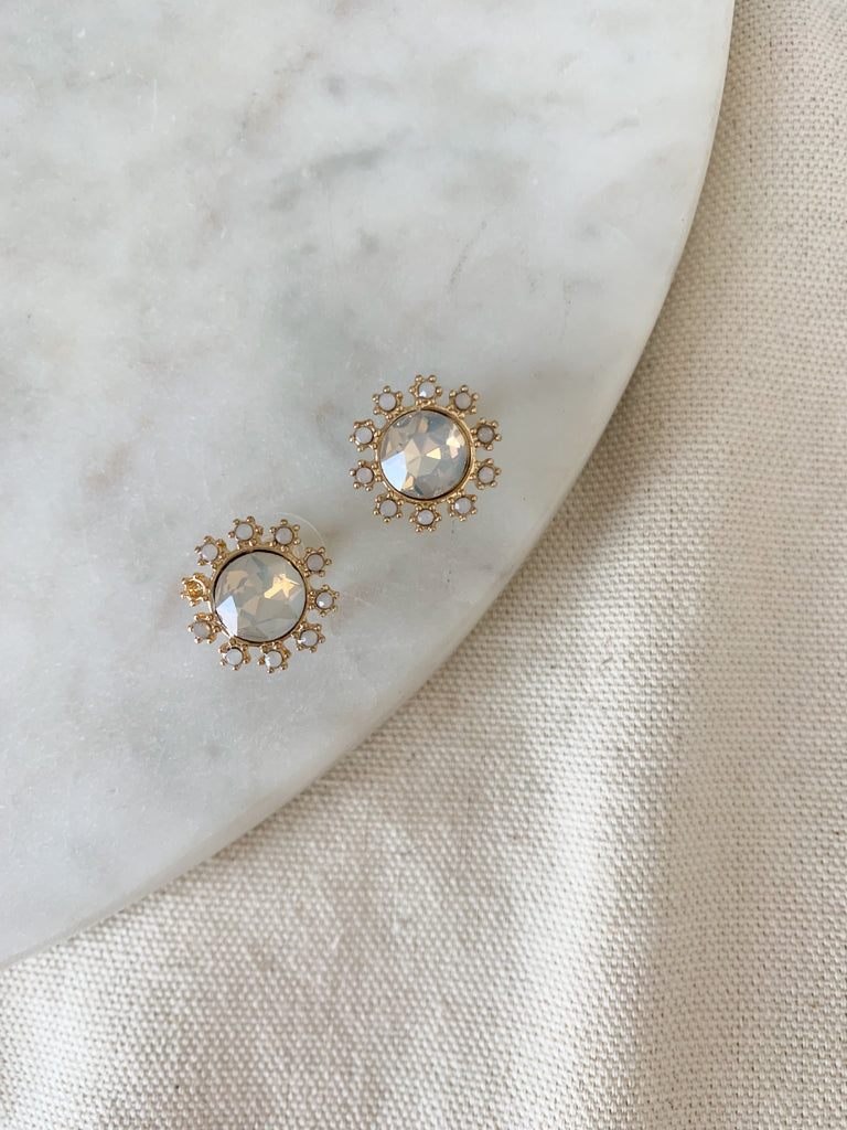 The Rhinestone & Opal inspired Gold Stud Earrings are so pretty. You can dress them up or down for any occasion. With a post stud backing, these earrings are very comfortable too. They have hints of gold as well and will pair nicely with all of your gold jewelry. 
