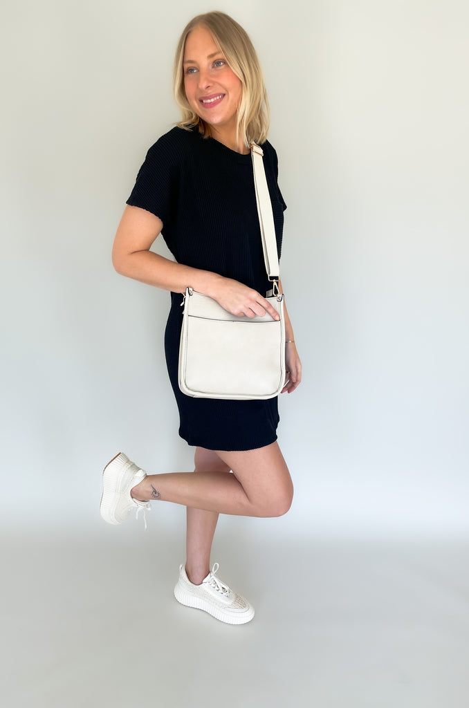 This ribbed shirt dress is a stylish way to stay comfortable. The short sleeves and front pocket make it practical and ideal for everyday wear, while the ribbed fabric gives it a unique and fashionable look. Add to your outfit with our Dee Denim Jacket for a layered look! Show off your style with the Jump on In Ribbed Shirt Dress! 