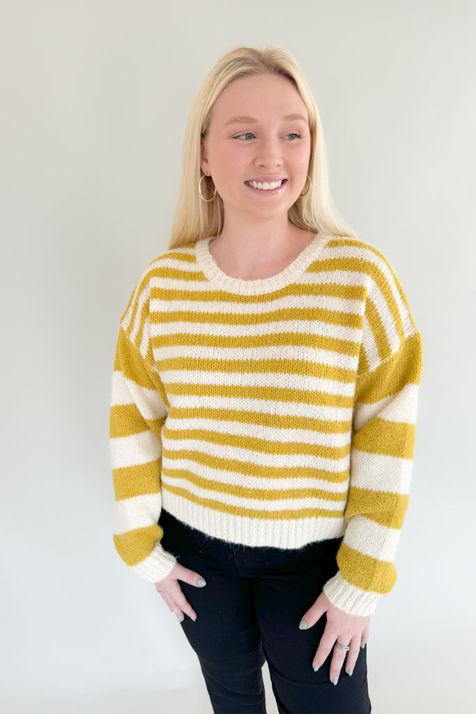 Create a look that standout  this season with our Sammie Chartreuse + Ivory Sweater! This striped round neck sweater is made with an ultra soft lightweight  fabric, plus a relaxed fit for added comfort. It looks elevated without the fuss!
