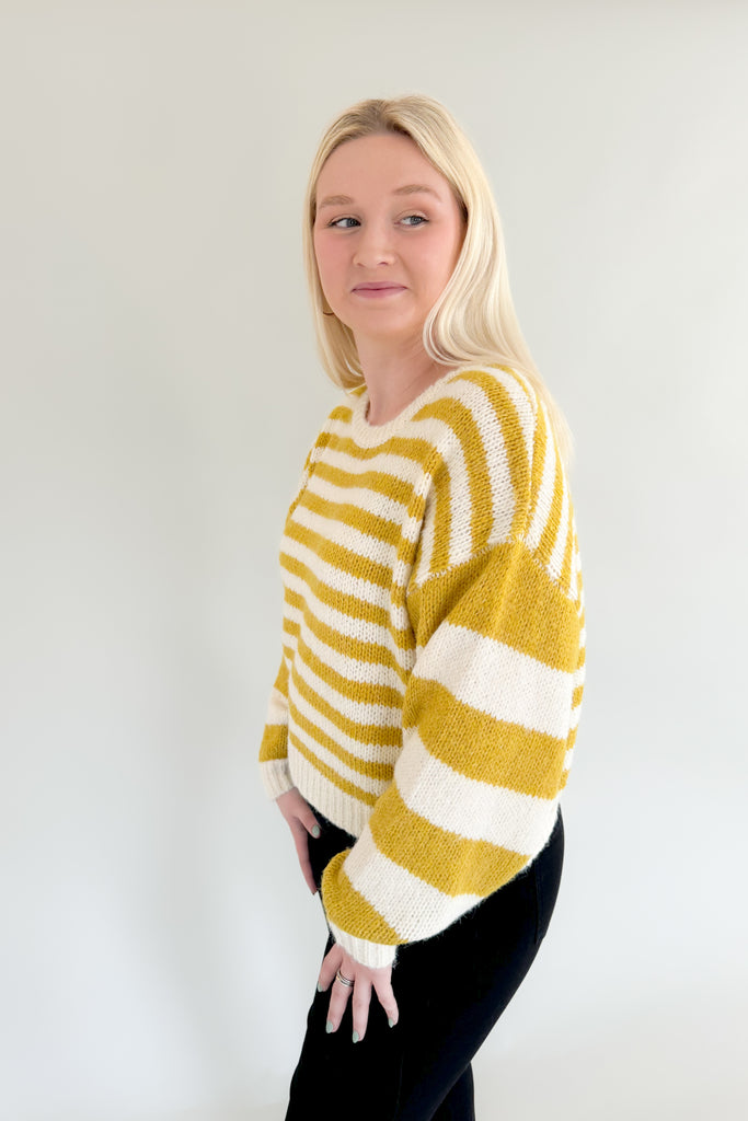 Create a look that standout  this season with our Sammie Chartreuse + Ivory Sweater! This striped round neck sweater is made with an ultra soft lightweight  fabric, plus a relaxed fit for added comfort. It looks elevated without the fuss!